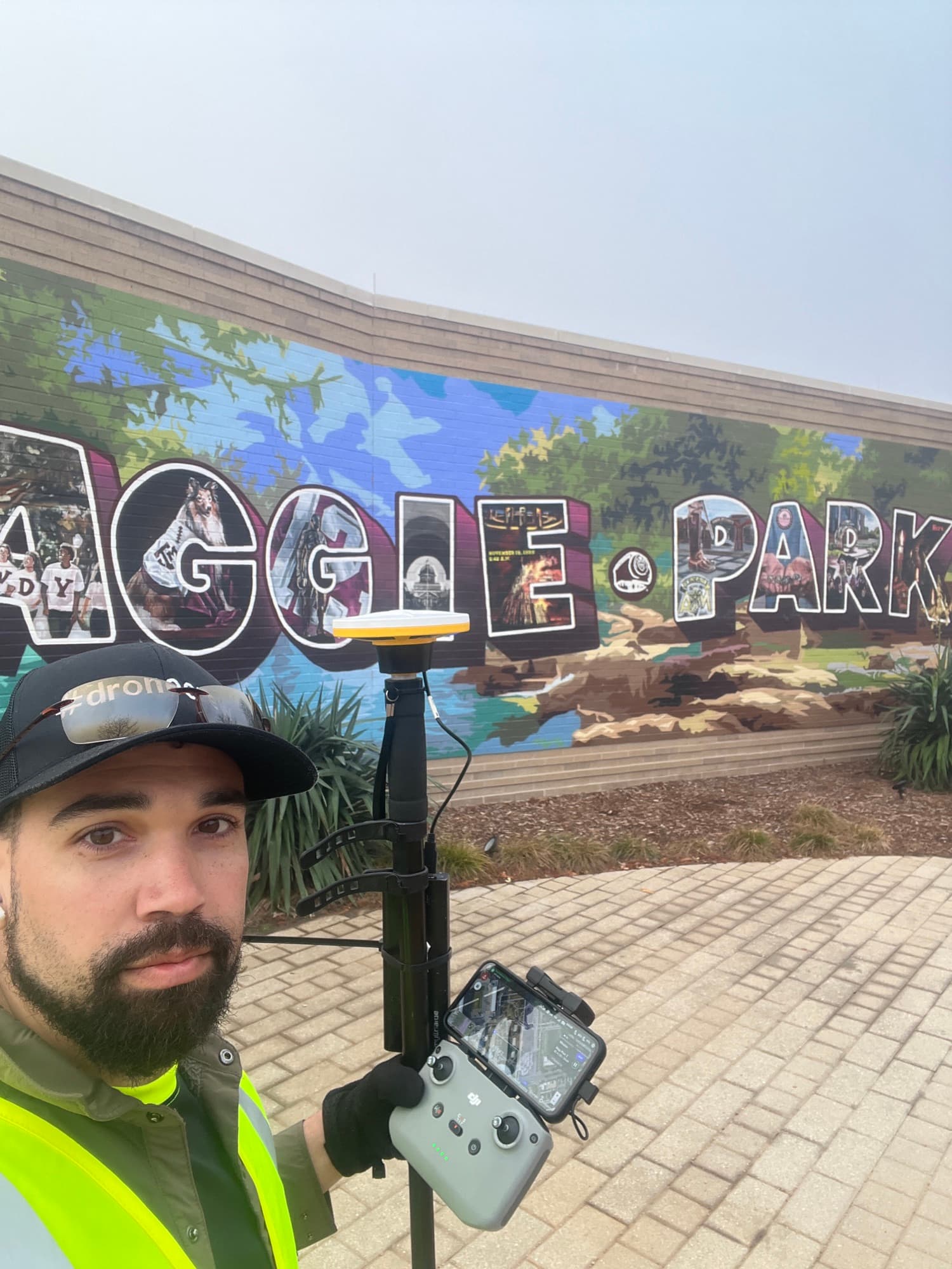 SQO SkyWorks pilot flying a drone on location